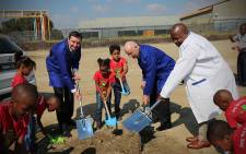 Stefan Huelsenberg(Rosslyn plant Director) Tim Abbott(CEO BMW South Africa) Mzwandile Masina(Deptuty Minister DTI) soil turning ceremony at landmark of new plant to be constructed.Picture : Kgothatso Mogale/EWN