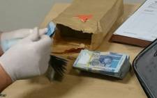 Customs officials have arrested five suspects at OR Tambo International Airport after they were caught with around R78 million worth of ‘undeclared’ currency. Picture: Supplied.