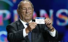 Spain’s former player Francisco Gento presents the name AS Monaco FC, during the draw for the 2014/2015 European Champions League group stages, on 28 August, 2014 in Monaco. Picture: AFP. 