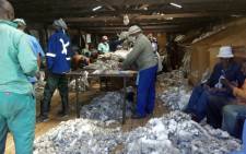 Farmers belonging to the Lesotho Wool and Mohair Association at a factory. Picture: Supplied.