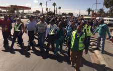 Demonstrators march from Gugulethu police station to Manenberg police station to protest against attacks on police. Picture: Monique Mortlock/EWN