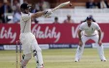 New Zealand batsman Kane Williamson (L) plays a shot against England during the second day of the first cricket Test match between England and New Zealand at Lord's cricket ground in London, on 22 May, 2015. Picture: AFP
