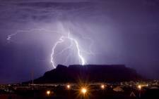 Lightining strikes behind Table Mountain.