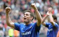 File: Chelsea's Frank Lampard gestures to fans. Picture: AFP.