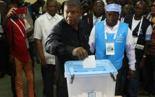 The People's Movement for the Liberation of Angola presidential candidate Joao Lourenco casts his vote in Luanda, on August 23, 2017 during the general elections. Picture: AFP