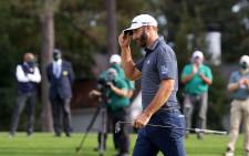 Dustin Johnson of the United States reacts on the 18th green after winning the Masters at Augusta National Golf Club on 15 November 2020 in Augusta, Georgia. Picture: AFP