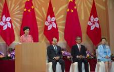 Hong Kong Chief Executive Carrie Lam (L) speaks during a ceremony to mark China's National Day in Hong Kong on 1 October 2020, which commemorates the 71st anniversary of the establishment of the People's Republic of China. Picture: AFP