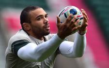South Africas wing Bryan Habana catches the ball during the captains run at Twickenham Stadium, west of London, on October 23, 2015, on the eve of the teams 2015 Rugby Union World Cup semi-final match against New Zealand. AFP PHOTO / GABRIEL BOUYS