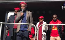 EFF leader Julius Malema addressing supporters outside the Johannesburg Central Police Station on 9 June 2017. Picture: Kgothatso Mogale/EWN.