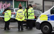 FILE: Manchester police at a crime scene. Picture: AFP