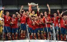 Spanish players celebrate after winning the Euro 2012 football championships final match Spain vs Italy on 1 July , 2012 at the Olympic Stadium in Kiev. Picture: AFP