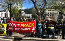 Protesters gather outside Parliament to show their opposition to the government’s decision to lift a moratorium on shale-gas exploration in the Karoo. Picture: Nathan Adams/EWN