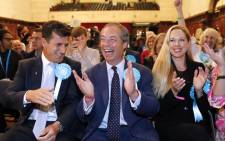 Brexit Party leader Nigel Farage (centre) reacts after the European Parliament election results for the UK South East Region are announced at the Civic Centre Southampton, Southern England, on early 27 May 2019. Picture: AFP