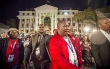 Julius Malema leaves parliament after making a statement to press in response to how the EFF were thrown out of the State of the Nation Address 2015. Picture: Thomas Holder/EWN