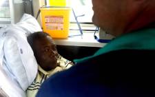 Jackie Selebi is seen in the back of an ambulance. Picture: SAPA
