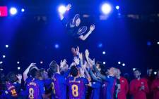 Barcelona's Andres Iniesta and team mates celebrate after winning the La Liga championship. Picture: Twitter @FCBarcelona.