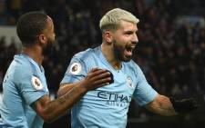 Manchester City's Argentinian striker Sergio Aguero (R) celebrates scoring their third goal to complete his hattrick during the English Premier League football match between Manchester City and Arsenal at the Etihad Stadium in Manchester, north west England, on 3 February 2019. Picture: AFP