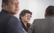 Minister Lynne Brown chats to new members of her board after a briefing with the Eskom board and the media on 15 December 2017. Picture: Thomas Holder/EWN
