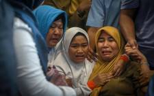 Family members of the crashed Indonesian Lion Air JT-610 react at Pangkal Pinang airport, in Bangka Belitung province on 29 October 2018. Picture: AFP.