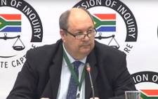 A screenshot of former Crime Intelligence official Kobus Roelofse appearing at the state capture inquiry on 19 September 2019. Picture: SABC Digital News/Youtube
