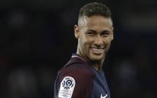 FILE: Paris Saint-Germain's Brazilian forward Neymar smiles during the French L1 football match Paris Saint-Germain (PSG) vs Toulouse FC (TFC) at the Parc des Princes stadium in Paris on 20 August 2017. Picture: AFP
