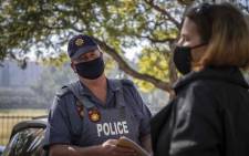 Police in Pretoria tell supporters of the national protest against the tobacco ban that they are not allowed to protest during lockdown. Picture: Abigail Javier/EWN