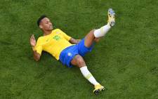 FILE: Brazil's forward Neymar falls on the ground during the Russia 2018 World Cup round of 16 football match between Brazil and Mexico at the Samara Arena in Samara on 2 July 2018. Picture: AFP.