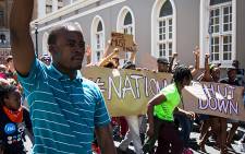 UCT protesters march down Spin Street in Cape Town on their way to Parliament. Picture: Anthony Molyneaux/EWN