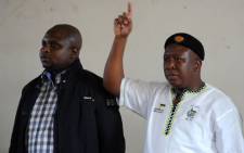 Expelled ANC Youth league president Julius Malema is seen with Floyd Shivambu at the Lenasia Recreational Centre in southern Johannesburg on Wednesday, 12 September 2012 where they arrived to listen to the grievances of soldiers. Picture: Werner Beukes/SAPA