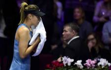 Russia's Maria Sharapova wipes her face as she plays against Australia's Daria Gavrilova during their match at the St. Petersburg Ladies Trophy tennis tournament at Saint Petersburg's Sibur Arena on 28 January 2019. Picture: AFP