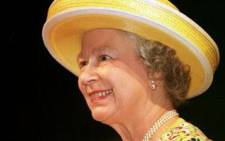 Queen Elizabeth II smiles at the Stratford Theatre as watches Shakespeare's "The Taming Of The Shrew" in Ontario, Canada. Picture: AFP