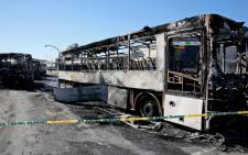 Torched Golden Arrow buses in Nyanga, Cape Town on Monday 1 September 2014. Picture: Sapa.
