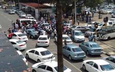 Uber drivers blocking 7th Avenue in Parktown with their cars. Picture: Supplied.