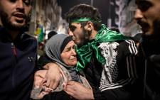 A Palestinian prisoner hugs his mother after being released from an Israeli jail in exchange for Israeli hostages released by Hamas from the Gaza Strip, in Ramallah in the occupied West Bank on 26 November 2023. Picture: AFP