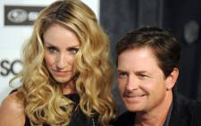 Actress Tracy Pollan and actor Michael J. Fox (R) arrive at the 5th annual “Scream Awards” at the Greek Theatre in Los Angeles, California on October 16, 2010. Picture: AFP.
