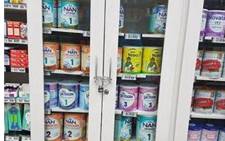 A screengrab of a Facebook post about a Johannesburg store keeping its baby formula under lock and key.