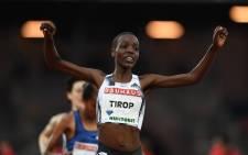 FILE: Kenya's Agnes Jebet Tirop celebrates after winning in the women's 5,000m during the IAAF Diamond League competition on 30 May 2019 in Stockholm, Sweden. Picture: Jonathan NACKSTRAND/AFP
