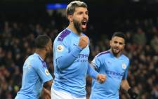 Manchester City striker Sergio Aguero (C) celebrates scoring the opening goal during the English Premier League football match between Manchester City and Sheffield United at the Etihad Stadium in Manchester, north west England, on 29 December 2019. Picture: AFP