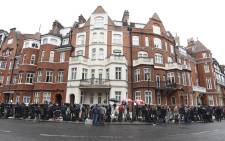 Members of the media stand outside the Ecuadorian Embassy where Julian Assange has sought political asylum, in London, on 5 February 2016. Picture: EPA/Facundo Arrizabalaga.