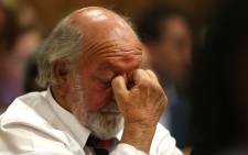 Barry Steenkamp, father of Reeva Steenkamp, reacts as judgment is handed down in the murder trial of Oscar Pistorius at the High Court in Pretoria on 12 September 2014. Picture: Pool.