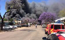 Authorities on the scene of a fire at a Pretoria West factory. Picture: ER24