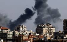 Smoke billows from Israeli air strikes in the Gaza Strip, controlled by the Palestinian Islamist movement Hamas, on May 11, 2021. Israel and Hamas exchanged heavy fire, in a dramatic escalation between the bitter foes sparked by unrest at Jerusalem's flashpoint Al-Aqsa Mosque compound. Picture: AFP