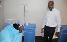 MDC leader Nelson Chamisa (right) visits one of the youth leaders in hospital on 15 May 2020. Picture: @mdczimbabwe/Twitter