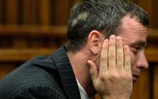 An emotional Oscar Pistorius at the High Court in Pretoria during his murder trial on 10 March 2014. Picture: Pool.