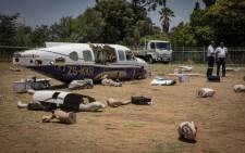 Dummies and debris from the plane crash drill litter an area designated for the simulation near OR Tambo Airport. Picture: Thomas Holder/EWN