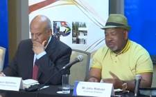 A screengrab of Eskom board chairperson Jabu Mabuza and Public Enterprises Minister Pravin Gordhan at a media briefing on 19 March 2019.