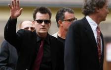 Charlie Sheen arrives at the Pitkin County Courthouse on August 2, 2010 in Aspen, Colorado. Picture: AFP.