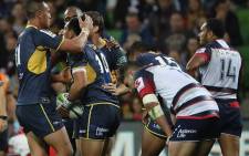 ACT Brumbies players celebrate after beating the Melbourne Rebels 30-22. Picture: Brumbies ‏@BrumbiesRugby.