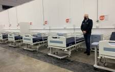 Western Cape Premier Allan Winde on 25 May 2020 examined the province’s makeshift COVID-19 field hospital at the Cape Town International Convention Centre. Picture: Kaylynn Palm/EWN.











