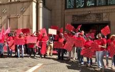 Union members from Cosatu picketing outside the Chamber of Mines calling on mining companies to take the safety of miners more seriously. Picture: Katleho Sekhotho/EWN.